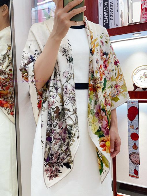 The newly launched double-sided same color DIOR square scarf is adorned with Le Bal des Libe9iuzck7o