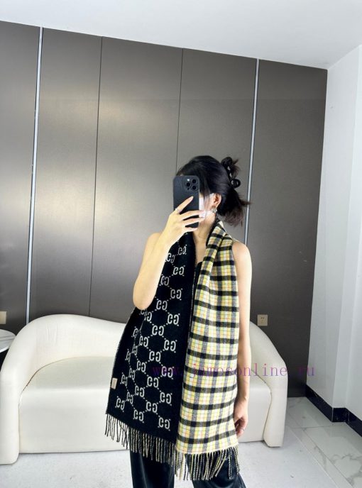 The 2023 Gucci Classic Cashmere Scarf is a double-sided scarf with a checkered pattern on ond2cbgg2v