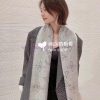 Louis Vuitton's new double-sided scarf, Mahina Flight Mode scarf, is woven with jacquard tec41tcmhvt