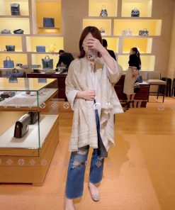 The Amazing Long Scarf features Monogram elements pieced together, referencing the intricaterock3ewk