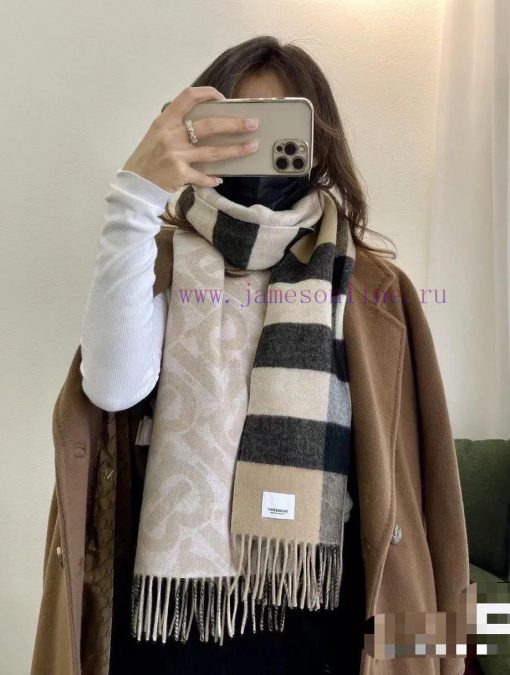 The beige double-sided scarf features the latest Tb print on one side and a classic checkereax03gjed - Image 2