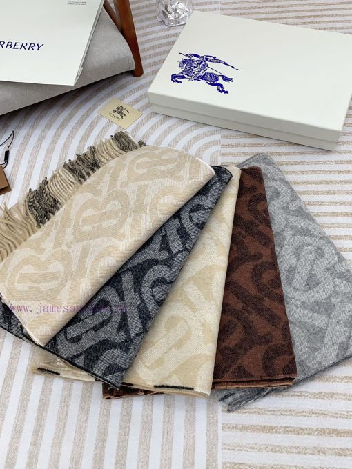 The beige double-sided scarf features the latest Tb print on one side and a classic checkereax03gjed - Image 3