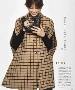 DIOR's latest double-sided cashmere cape, featuring a high neck and small lapel design that g189v52o