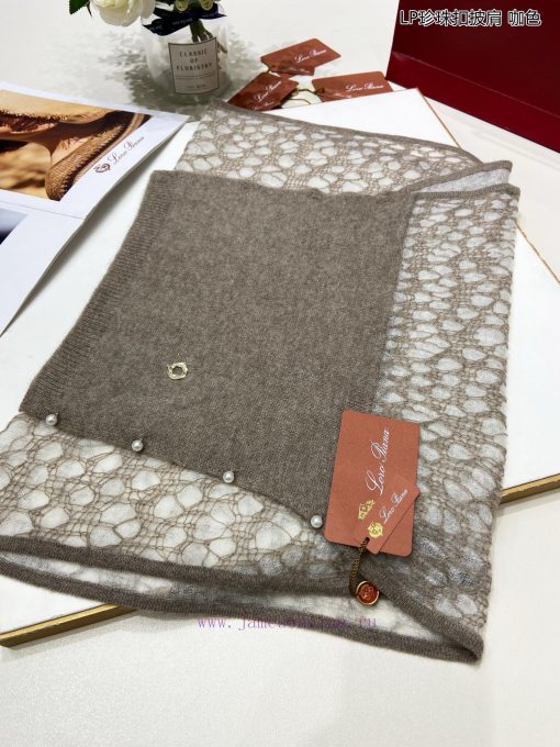 The new Loro Piana Cattle LP Pearl Button Shawl is a multifunctional shawl that can be wrapp66f7o4pp - Image 11