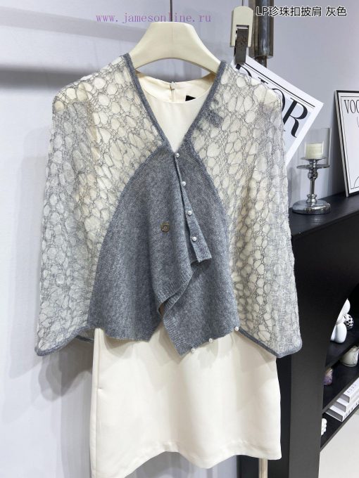 The new Loro Piana Cattle LP Pearl Button Shawl is a multifunctional shawl that can be wrappriwvr4ww - Image 5