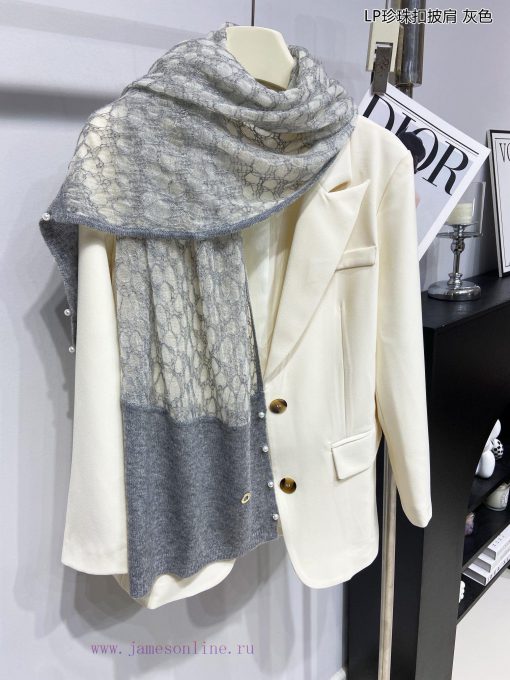 The new Loro Piana Cattle LP Pearl Button Shawl is a multifunctional shawl that can be wrappriwvr4ww - Image 6
