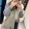 Hermes, a high-end cashmere knitted scarf that can be formal or casual, with a very classicaibs95e4y