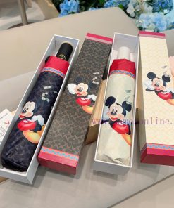 Coach and Coach's new Disney co branded three fold automatic folding umbrella for sunny and obhnh0s9