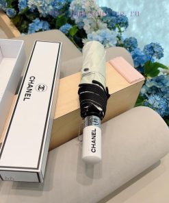 CHANEL 2024 new solid color wrapped edge three fold automatic folding umbrella with delicate1up0p856