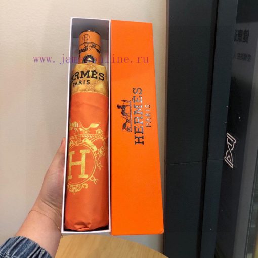 Herm è s Classic Orange Premium H Home Triple Fold Automatic Umbrella is presented with its fqxsdf1n