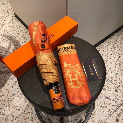 Herm è s Classic Orange Premium H Home Triple Fold Automatic Umbrella is presented with its fqxsdf1n - Image 4