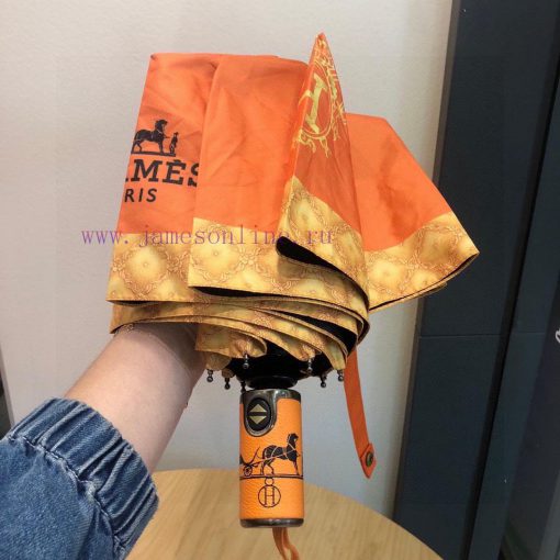 Herm è s Classic Orange Premium H Home Triple Fold Automatic Umbrella is presented with its fqxsdf1n - Image 8