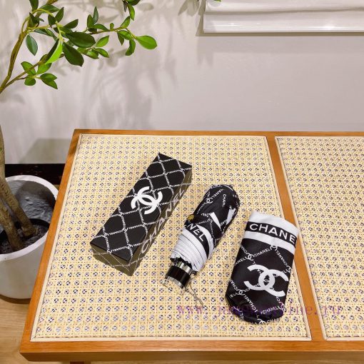 Chanel's five fold eye-catching umbrella is the hottest fashion item of the year. Don't be pr4x3bho8 - Image 3