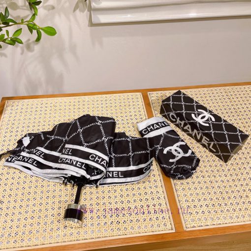 Chanel's five fold eye-catching umbrella is the hottest fashion item of the year. Don't be pr4x3bho8 - Image 6