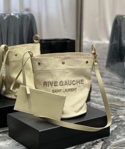 Yves Saint Laurent Bags 𝗥𝗜𝗩𝗘 𝗚𝗔𝗨𝗖𝗛𝗘The latest RIVE GAUCHE French linen bucket bag, with its simple and atmospheric d 8fsrdqfm