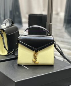 Yves Saint Laurent Bags NEWBlack rice gold buckle_The other design of the CASSANDRA mini handbag series is its rotat 2sc0ltsr