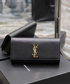 Yves Saint Laurent Bags Classic Kate_ HandbagBlack plain gold buckleThe classic flip style handbag features a highly u9iskmmi