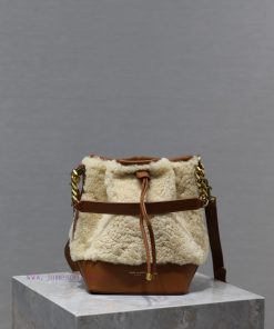 Yves Saint Laurent Bags Lamb woolEMMANUELLE Quilted Bucket BagMy love for bucket bags is serious. The bag opening is 9s0iva8r