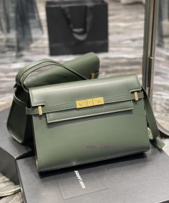 Yves Saint Laurent Bags 𝑴𝒂𝒏𝒉𝒂𝒕𝒕𝒂𝒏 The latest revision of the Manhattan baguette bag features a full leather lining, v7l0nj5t