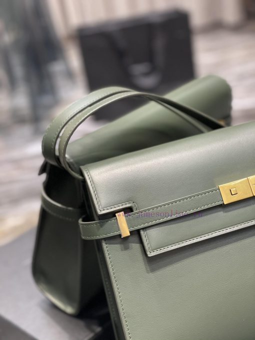 Yves Saint Laurent Bags 𝑴𝒂𝒏𝒉𝒂𝒕𝒕𝒂𝒏 The latest revision of the Manhattan baguette bag features a full leather lining, v7l0nj5t - Image 4