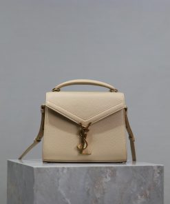 Yves Saint Laurent Bags Apricot colored golden buckle caviarThe other design of the CASSANDRA mini handbag series is jon589qr
