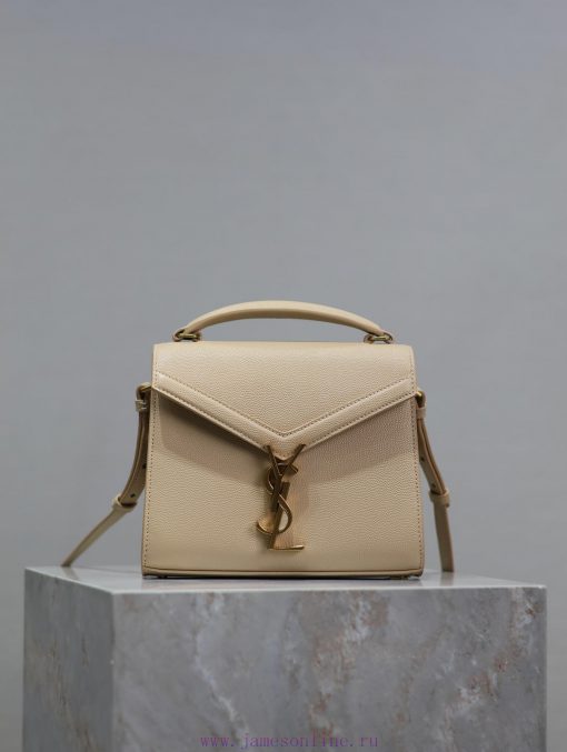 Yves Saint Laurent Bags Apricot colored golden buckle caviarThe other design of the CASSANDRA mini handbag series is jon589qr